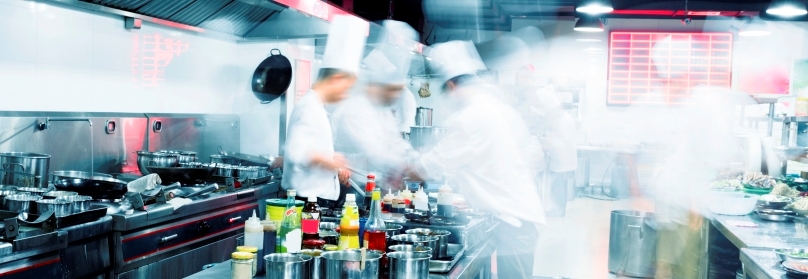 Chefs working in a commercial kitchen