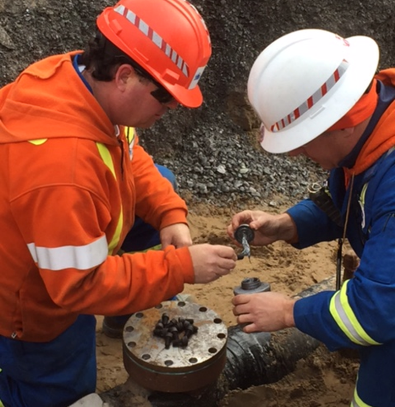 crews using new tap and stop equipment