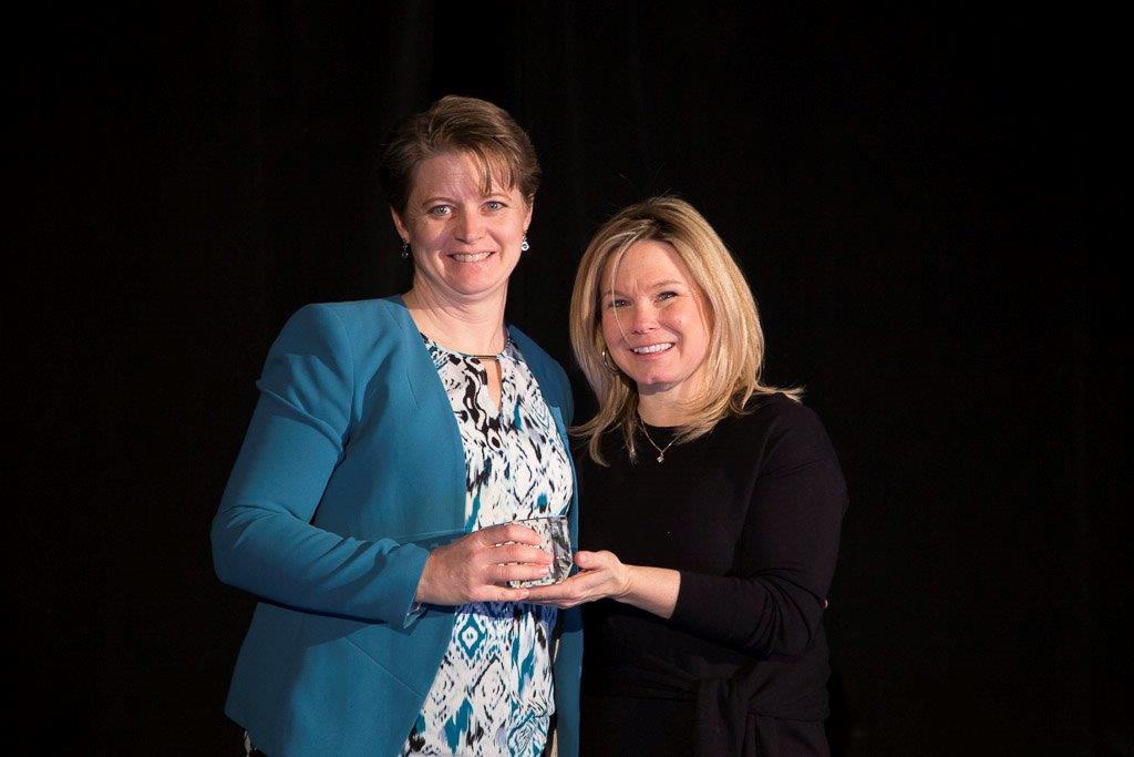 Canadian figure skater Josée Chouinard presents the ORCGA Member of the Year award to Karen Santucci