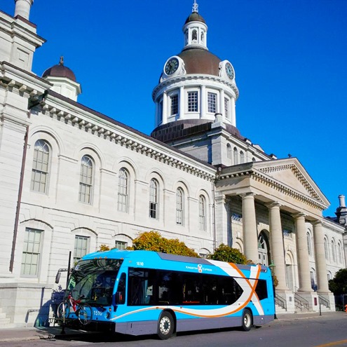 Express bus parked in front of City Hall
