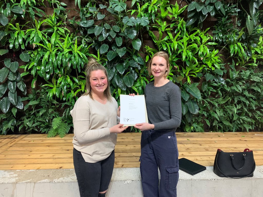 Chloe Smith (left), a second-year student in the Powerline Technician program at Algonquin College, was awarded the bursary by Lana Norton, Executive Director and Founder, Women of Powerline Technicians.