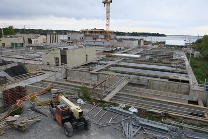 View from the top of the new dewatering building, looking at the existing plant and new construction of biological aerated filter (BAF) facility building. 