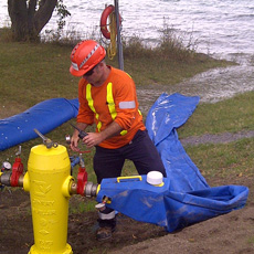 Operators flow rate a fire hydrant