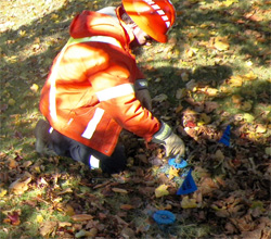 Utilities Kingston worker inspecting a service line